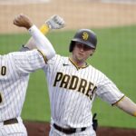 Cronenworth’s slam powers Padres to crucial series win over Reds