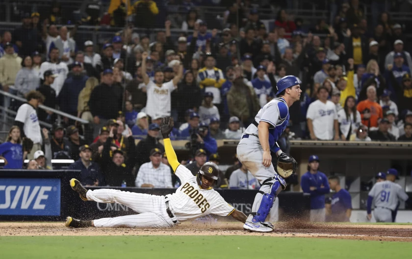 Padres beat Dodgers 3-2 in gritty extra-inning game /Padres